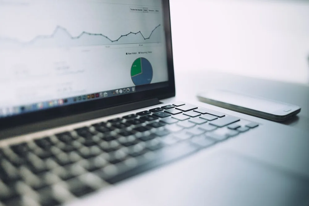 A modern business intelligence dashboard displaying charts, KPIs, and maps